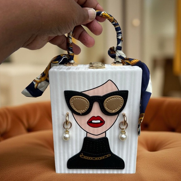 Stylish White and Black Mini Bag with Gold Accents - Picture 2 of 3